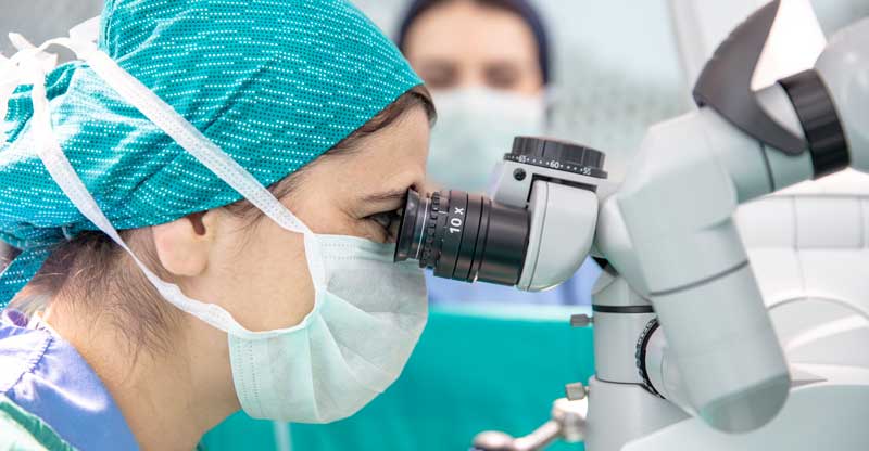 Robotic Surgery surgeon viewing through robot
